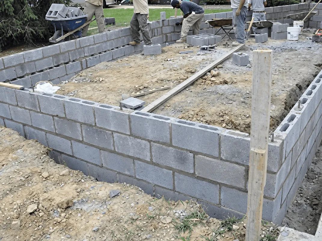 Professionals building a foundation with blocks in Ann Arbor, MI